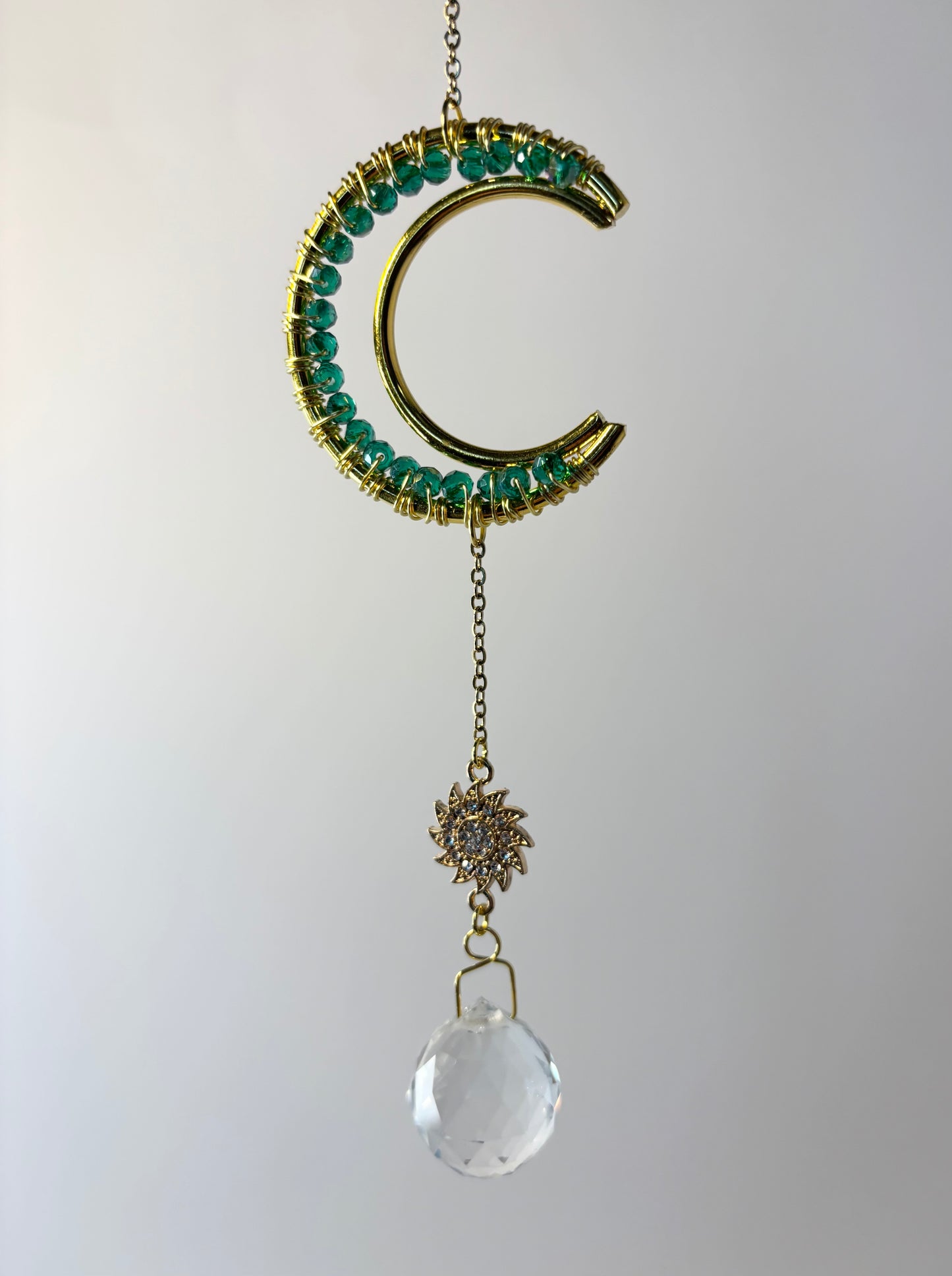 Small Gold Moon with Green, Sun