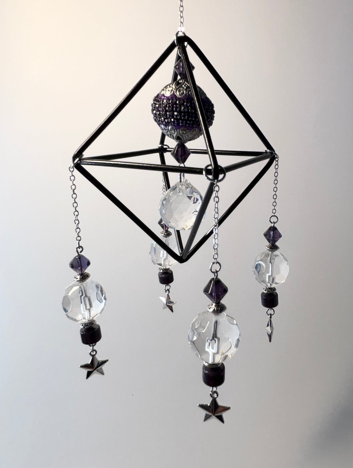Black Geometric Frame with 4 Pendants, Silver Stars