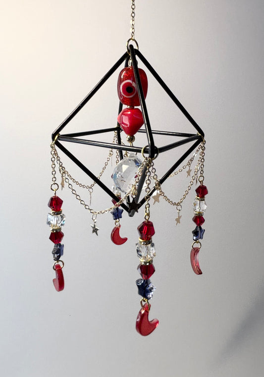 Black Geometric Frame with 4 Pendants, Red Moons